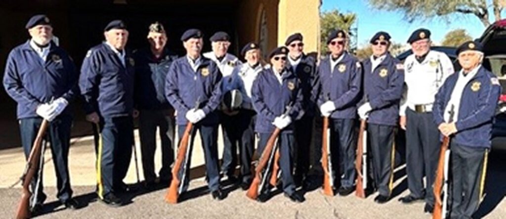 Post 132 Honor Guard members posing with rifles used for 21 gun salute.