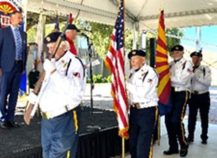 Post 132 Color Guard members posting flags at Stand Down event.