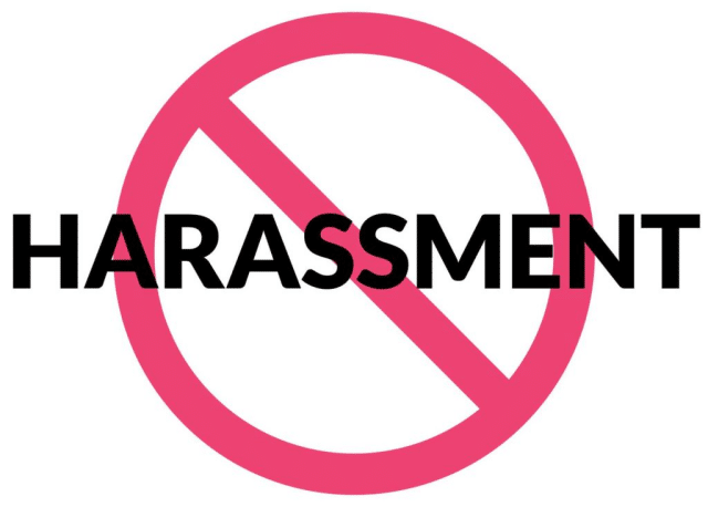 No harassment poster with Harassment in black letters and a red circle with slash behind the lettering.