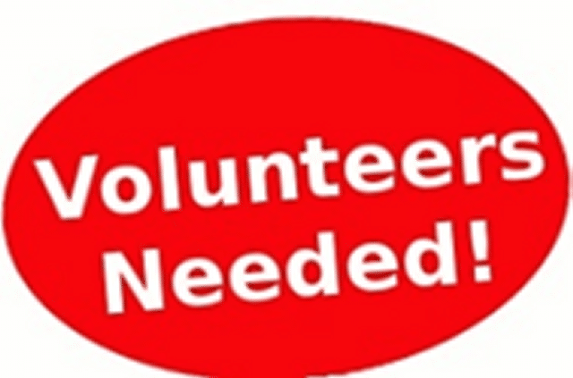 Volunteers Needed banner, red background, white lettering.