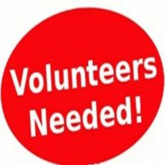 Red Volunteers Needed sign.